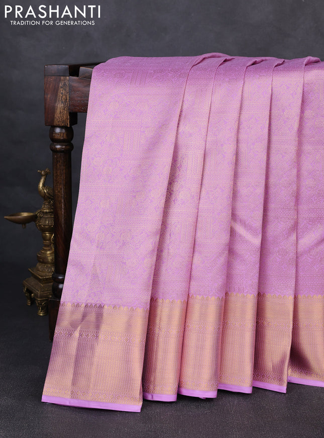 Pure kanchipuram silk saree lavender with allover zari woven brocade weaves and rich zari woven border