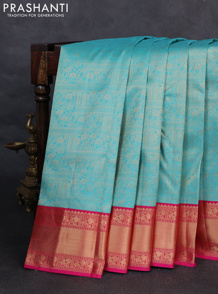 Pure kanchipuram silk saree teal blue and pink with allover zari woven brocade weaves and rich zari woven korvai border