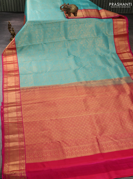 Pure kanchipuram silk saree teal blue and pink with allover zari woven brocade weaves and rich zari woven korvai border