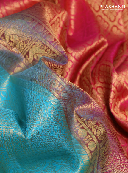 Pure kanchipuram silk saree teal blue and pink with allover zari woven brocade weaves and rich zari woven korvai border