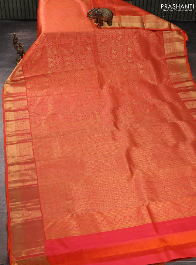 Pure kanchipuram silk saree orange with allover zari woven brocade weaves and rich zari woven border