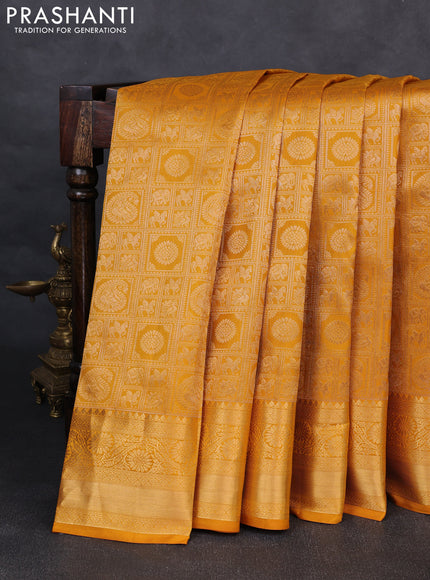 Pure kanchipuram silk saree mustard yellow with allover zari woven brocade weaves and rich zari woven border