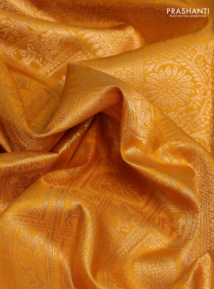 Pure kanchipuram silk saree mustard yellow with allover zari woven brocade weaves and rich zari woven border