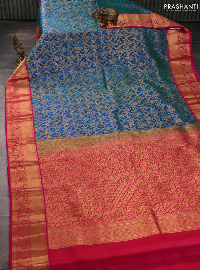 Pure kanchipuram silk saree dual shade of greenish blue and pink with allover zari woven brocade weaves and rich zari woven korvai border