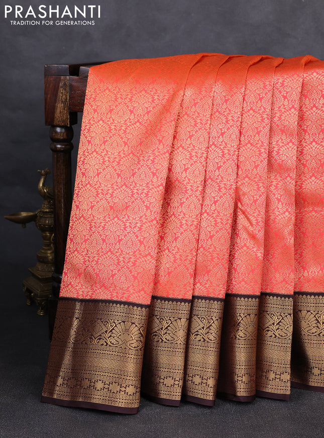 Pure kanchipuram silk saree orange and coffee brown with allover zari woven brocade weaves and rich zari woven korvai border