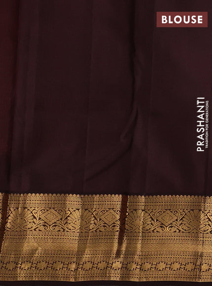 Pure kanchipuram silk saree orange and coffee brown with allover zari woven brocade weaves and rich zari woven korvai border