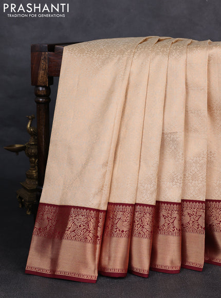 Pure kanchipuram silk saree cream and deep maroon with allover zari woven brocade weaves and rich zari woven korvai border