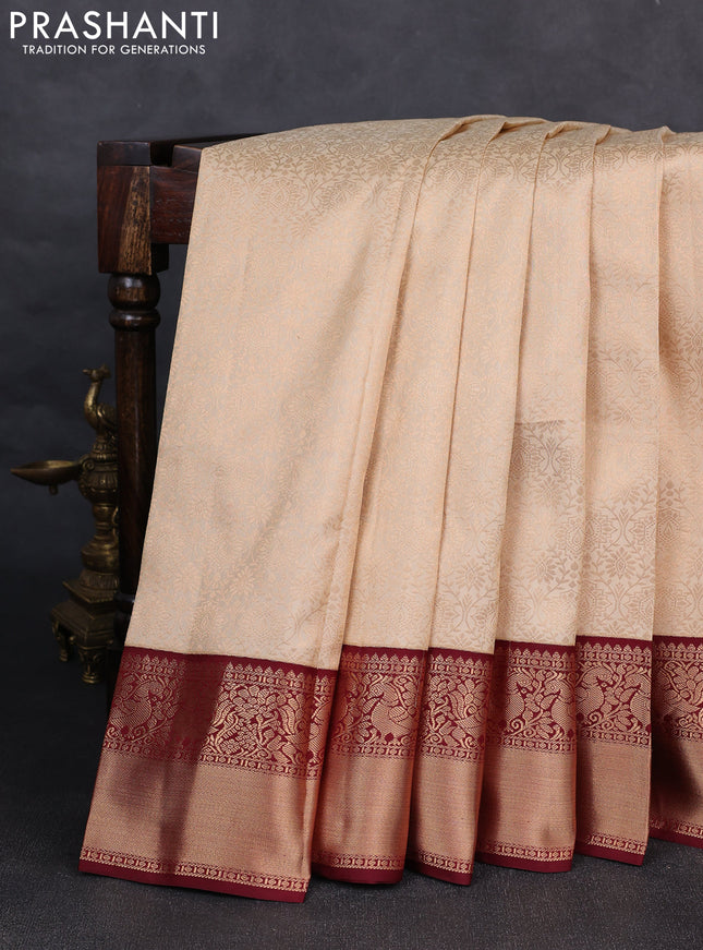 Pure kanchipuram silk saree cream and deep maroon with allover zari woven brocade weaves and rich zari woven korvai border