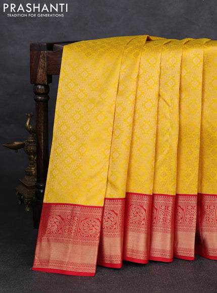 Pure kanchipuram silk saree yellow and red with allover zari woven brocade weaves and rich zari woven korvai border