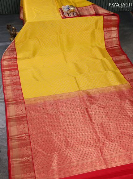 Pure kanchipuram silk saree yellow and red with allover zari woven brocade weaves and rich zari woven korvai border