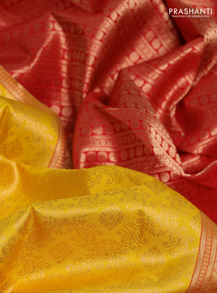 Pure kanchipuram silk saree yellow and red with allover zari woven brocade weaves and rich zari woven korvai border