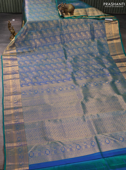 Pure kanchipuram silk saree dual shade of bluish green with allover zari woven peacock brocade weaves and rich zari woven border