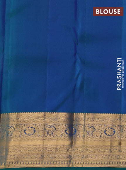 Pure kanchipuram silk saree dual shade of bluish green with allover zari woven peacock brocade weaves and rich zari woven border