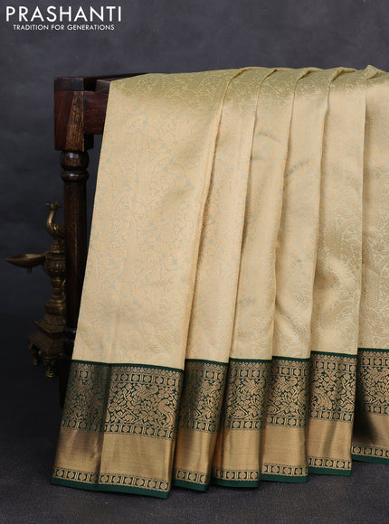 Pure kanchipuram silk saree mild pista green and green with allover zari woven brocade weaves and rich zari woven korvai border