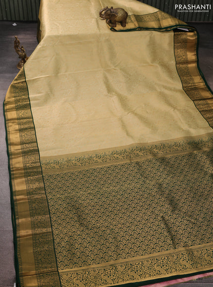 Pure kanchipuram silk saree mild pista green and green with allover zari woven brocade weaves and rich zari woven korvai border