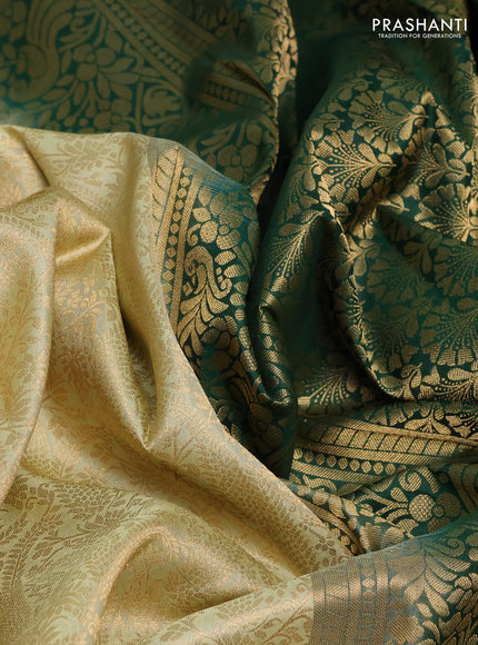 Pure kanchipuram silk saree mild pista green and green with allover zari woven brocade weaves and rich zari woven korvai border