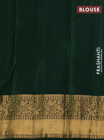 Pure kanchipuram silk saree mild pista green and green with allover zari woven brocade weaves and rich zari woven korvai border