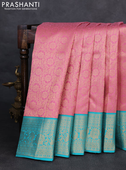 Pure kanchipuram silk saree light pink and teal blue with allover zari woven brocade weaves and rich zari woven korvai border
