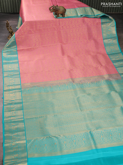 Pure kanchipuram silk saree light pink and teal blue with allover zari woven brocade weaves and rich zari woven korvai border