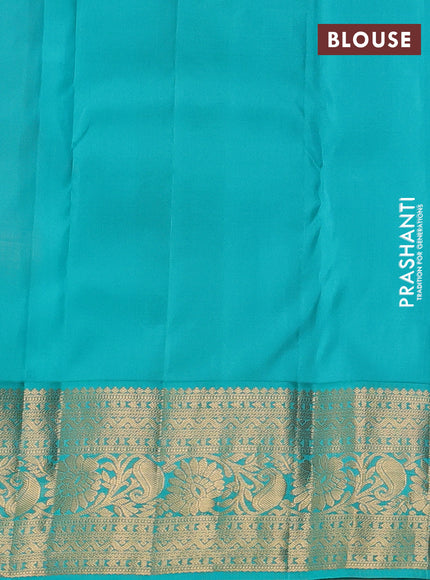 Pure kanchipuram silk saree light pink and teal blue with allover zari woven brocade weaves and rich zari woven korvai border