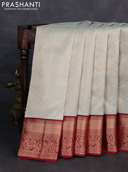 Pure kanchipuram silk saree pastel blue and maroon with allover zari woven brocade weaves and rich zari woven korvai border