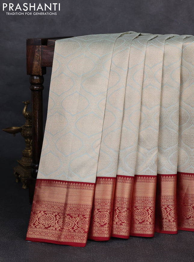 Pure kanchipuram silk saree pastel blue and maroon with allover zari woven brocade weaves and rich zari woven korvai border