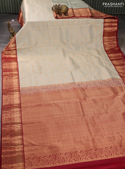 Pure kanchipuram silk saree pastel blue and maroon with allover zari woven brocade weaves and rich zari woven korvai border