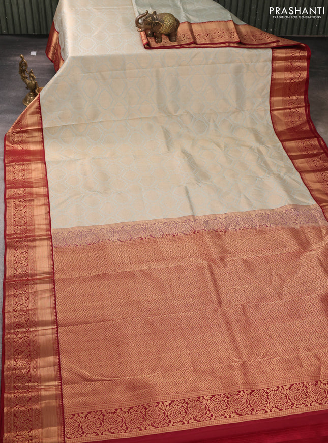 Pure kanchipuram silk saree pastel blue and maroon with allover zari woven brocade weaves and rich zari woven korvai border