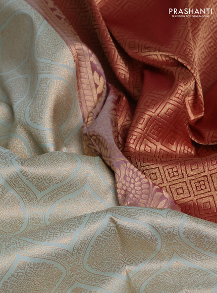 Pure kanchipuram silk saree pastel blue and maroon with allover zari woven brocade weaves and rich zari woven korvai border