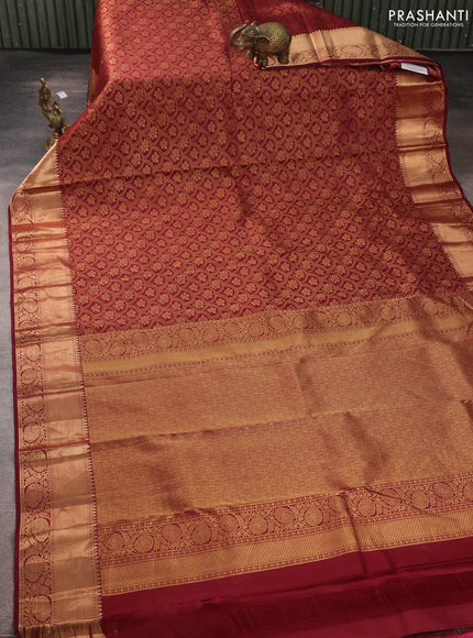Pure kanchipuram silk saree deep maroon with allover zari woven brocade weaves and rich zari woven border