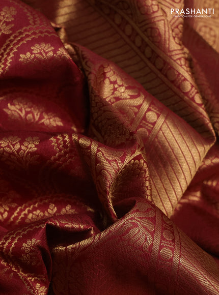 Pure kanchipuram silk saree deep maroon with allover zari woven brocade weaves and rich zari woven border