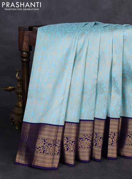 Pure kanchipuram silk saree light blue and blue with allover zari woven brocade weaves and rich zari woven korvai border