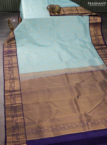 Pure kanchipuram silk saree light blue and blue with allover zari woven brocade weaves and rich zari woven korvai border