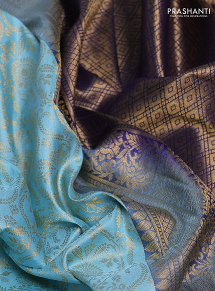Pure kanchipuram silk saree light blue and blue with allover zari woven brocade weaves and rich zari woven korvai border