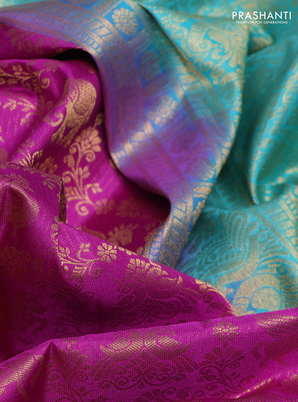 Pure kanchipuram silk saree purple and teal blue with allover zari woven brocade weaves and rich zari woven korvai border
