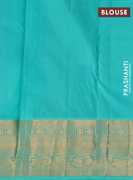 Pure kanchipuram silk saree purple and teal blue with allover zari woven brocade weaves and rich zari woven korvai border