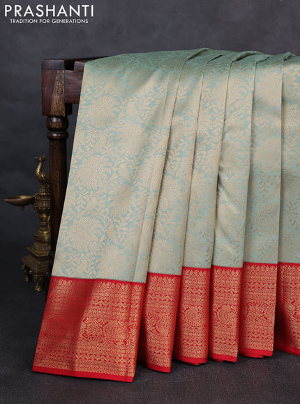 Pure kanchipuram silk saree pastel green and red with allover zari woven brocade weaves and rich zari woven korvai border