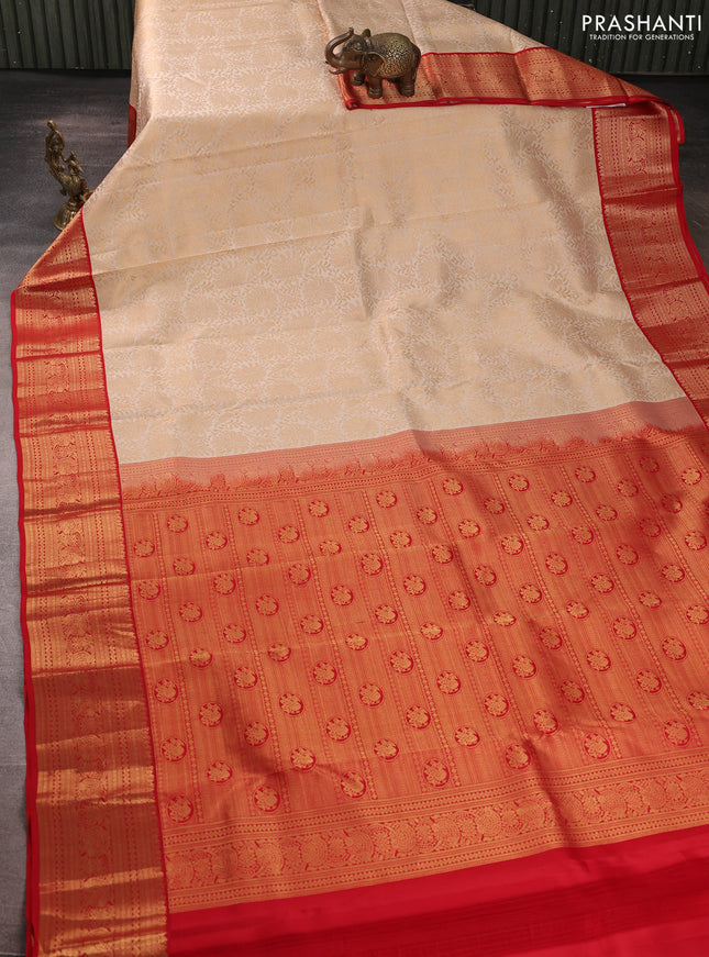 Pure kanchipuram silk saree cream and red with allover zari woven brocade weaves and rich zari woven korvai border