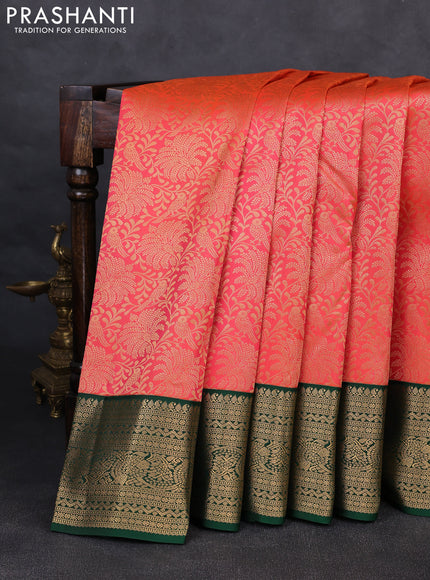 Pure kanchipuram silk saree peach orange and bottle green with allover zari woven brocade weaves and rich zari woven korvai border