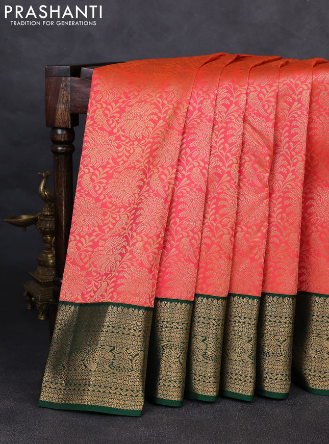 Pure kanchipuram silk saree peach orange and bottle green with allover zari woven brocade weaves and rich zari woven korvai border