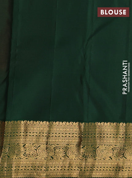 Pure kanchipuram silk saree peach orange and bottle green with allover zari woven brocade weaves and rich zari woven korvai border