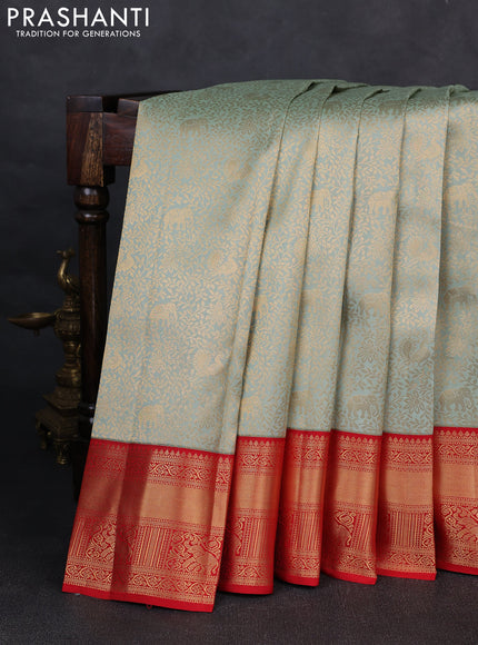 Pure kanchipuram silk saree pastel green and red with allover zari woven brocade weaves and rich zari woven korvai border