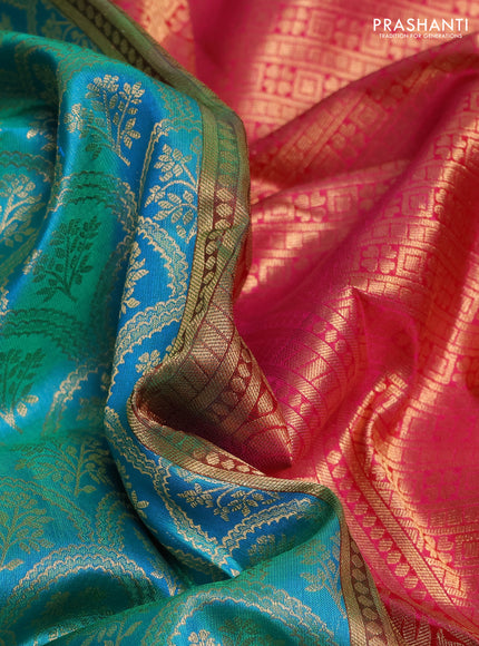 Pure kanchipuram silk saree teal green and pink with allover zari woven brocade weaves and rich zari woven korvai border