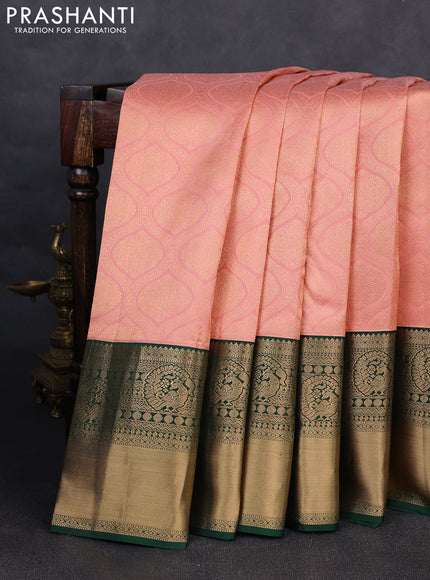 Pure kanchipuram silk saree peach and orange with allover zari woven brocade weaves and rich zari woven korvai border