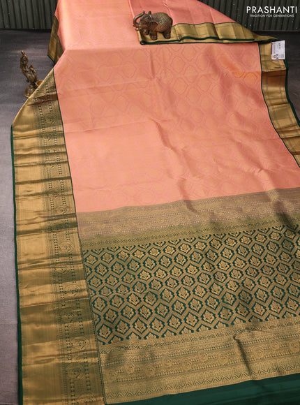 Pure kanchipuram silk saree peach and orange with allover zari woven brocade weaves and rich zari woven korvai border