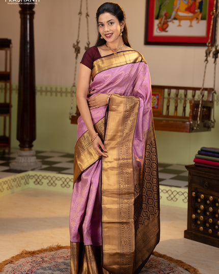 Pure kanchipuram silk saree lavender and deep jamun with allover zari woven brocade weaves and rich zari woven korvai border