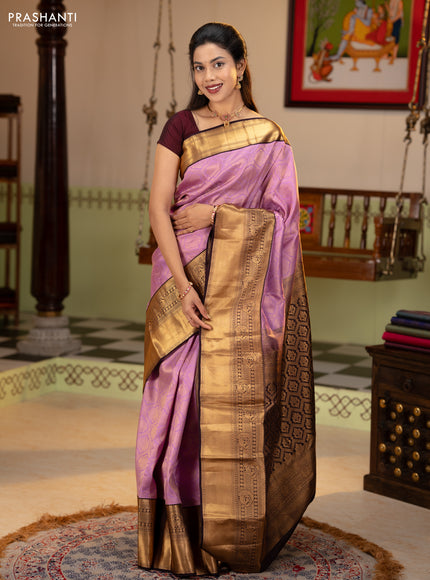 Pure kanchipuram silk saree lavender and deep jamun with allover zari woven brocade weaves and rich zari woven korvai border