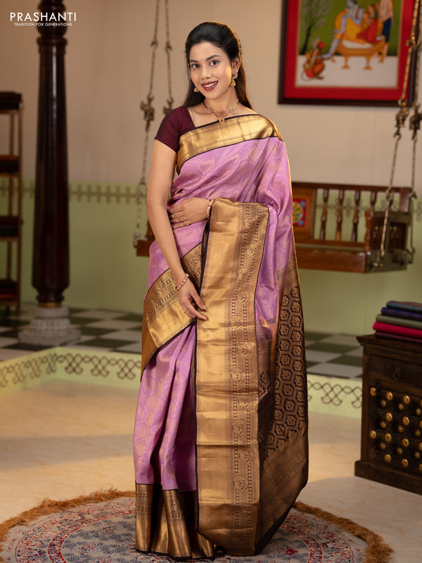 Pure kanchipuram silk saree lavender and deep jamun with allover zari woven brocade weaves and rich zari woven korvai border