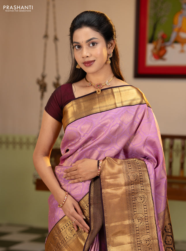 Pure kanchipuram silk saree lavender and deep jamun with allover zari woven brocade weaves and rich zari woven korvai border