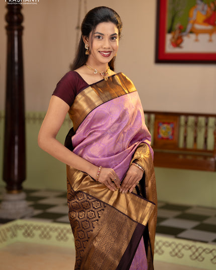 Pure kanchipuram silk saree lavender and deep jamun with allover zari woven brocade weaves and rich zari woven korvai border